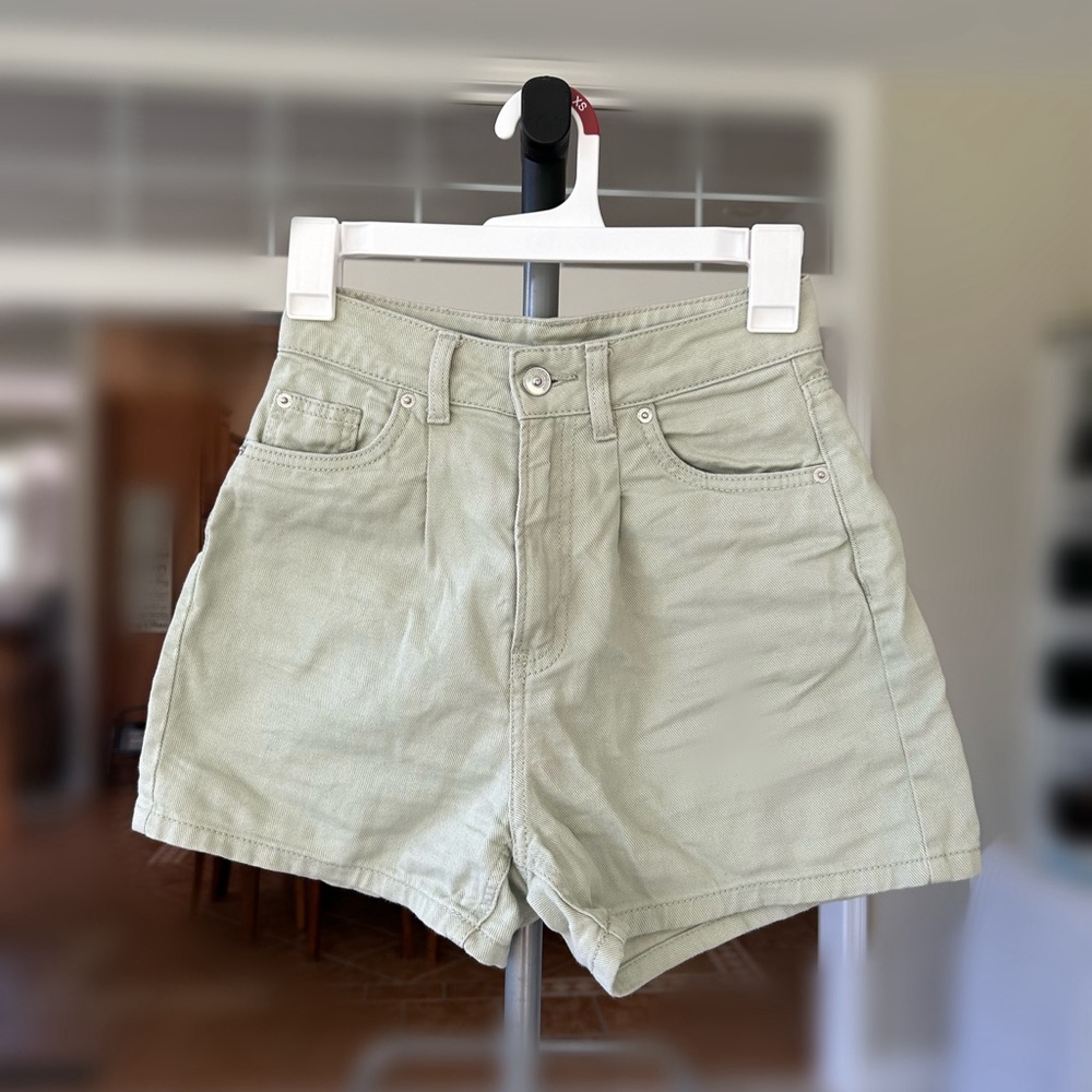 green denim shorts